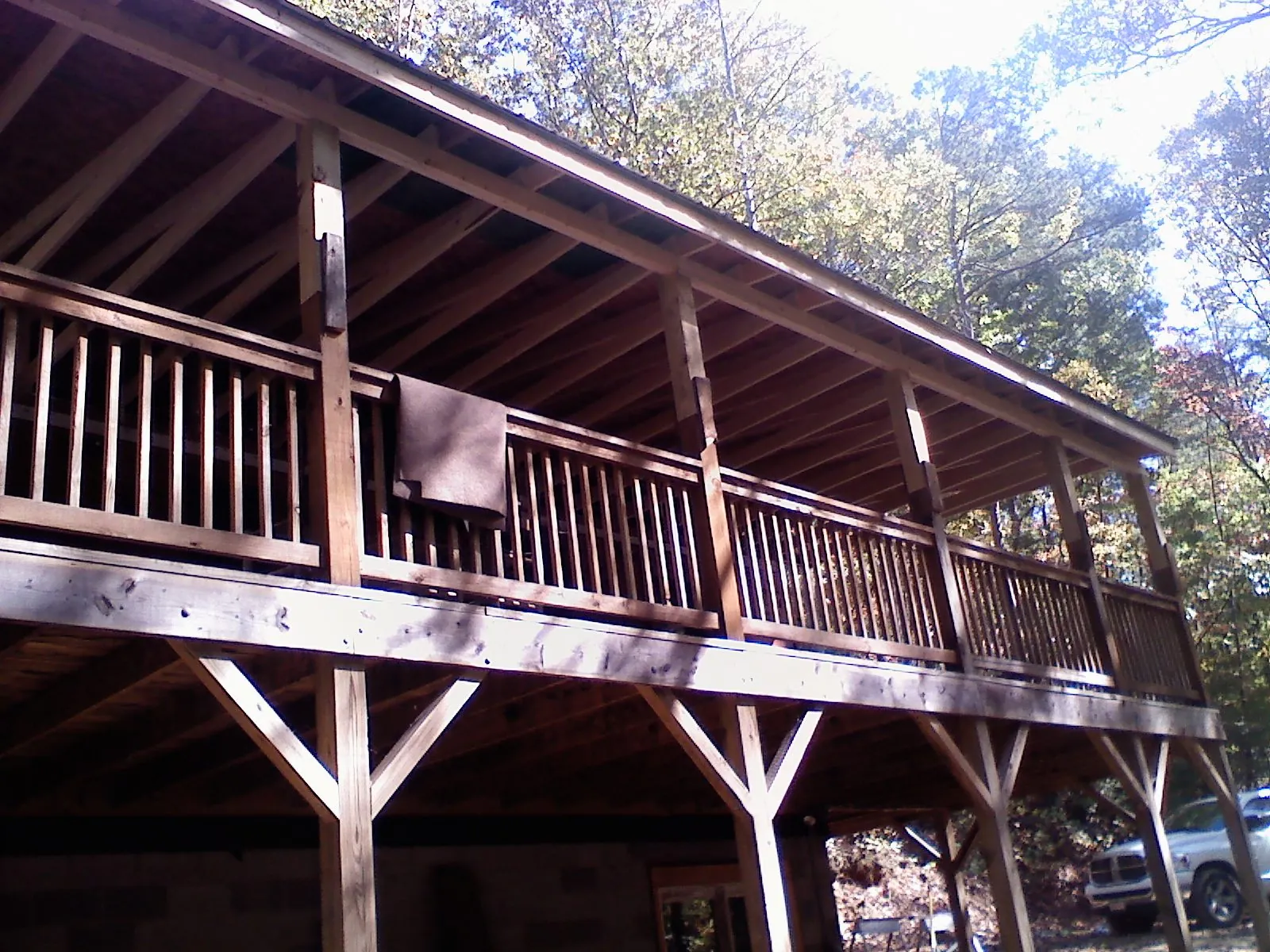 Timber framing under a new elevated porch and deck — Roof Leak Repair in Glen Oaks by Roofing Brothers